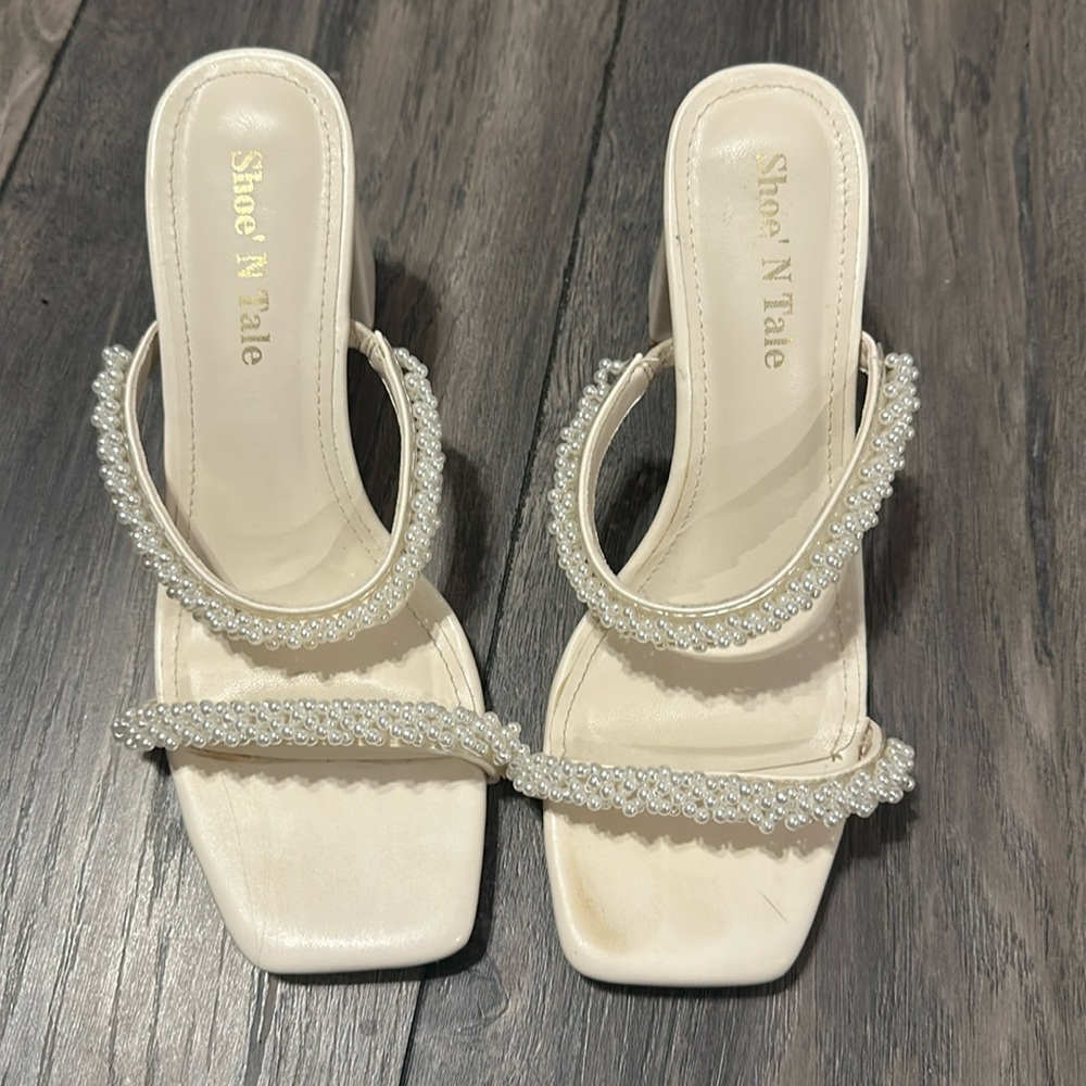 White pearl heels, size 7.5. Worn once.